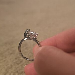 Stunning Silver Ring with Clear Gemstone And Penguin Accent